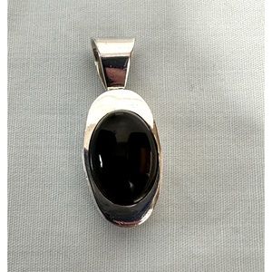 Sterling silver pendant with black stone